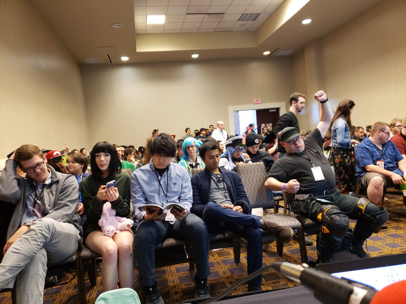 The room was filled to capacity within the first few minutes, with even more people standing at the back.